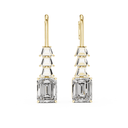 Elegant emerald cut diamond drop earrings featuring a geometric drop design with sparkling emerald-cut stones by Orova Jewels.