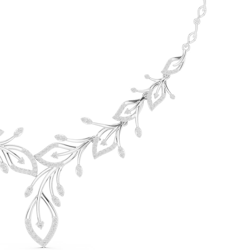 Nature-inspired yellow gold leaf necklace with an elegant vine design and sparkling stone accents by Orova Jewels.