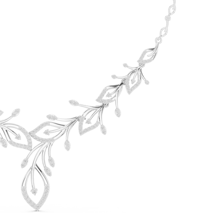 Nature-inspired yellow gold leaf necklace with an elegant vine design and sparkling stone accents by Orova Jewels.