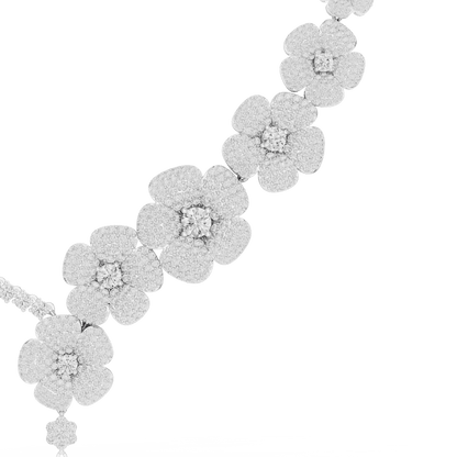 Floral diamond statement necklace featuring sparkling flower motifs and an elegant drop centerpiece by Orova Jewels.