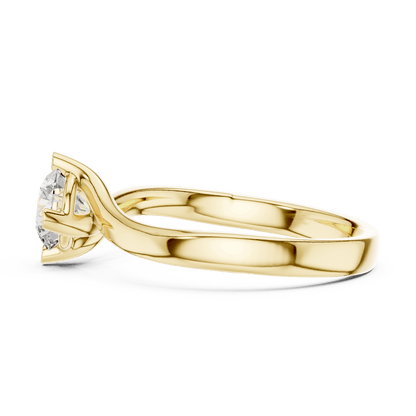 Twisted solitaire diamond engagement ring featuring a round-cut center stone in a four-prong setting with a sleek sculpted twisted band by Orova Jewels.