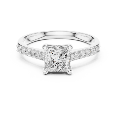 Classic pavé solitaire diamond engagement ring featuring a round-cut center stone in a four-prong setting with a sparkling pavé diamond band by Orova Jewels.