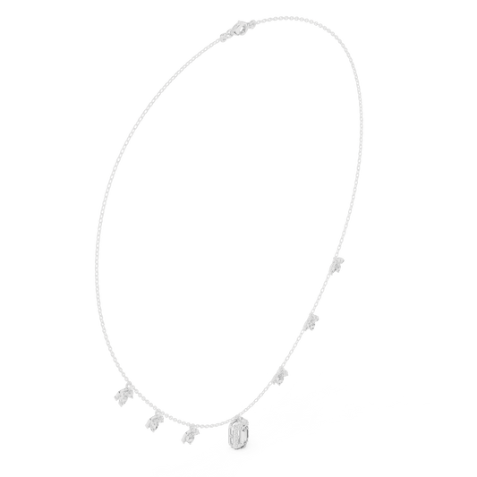 Emerald-cut diamond charm necklace featuring a delicate chain with sparkling station accents and a modern centerpiece by Orova Jewels.