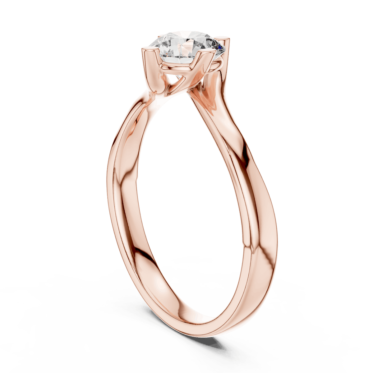 Twisted solitaire diamond engagement ring featuring a round-cut center stone in a four-prong setting with a sleek sculpted twisted band by Orova Jewels.