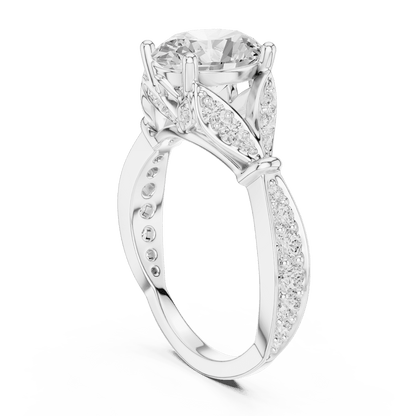 Vintage Leaf Solitaire Diamond Engagement Ring featuring a round brilliant center stone, marquise leaf motifs, and pavé diamond accents on a polished band by Orova Jewels.