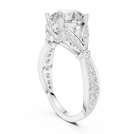 Vintage Leaf Solitaire Diamond Engagement Ring featuring a round brilliant center stone, marquise leaf motifs, and pavé diamond accents on a polished band by Orova Jewels.