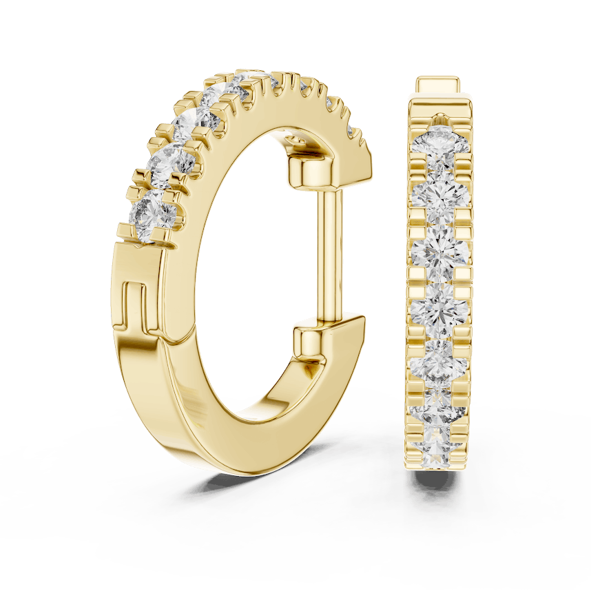 Diamond huggie hoop earrings featuring a row of sparkling round stones with a secure hinged closure by Orova Jewels.