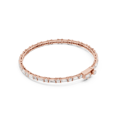 Baguette and round diamond tennis bracelet featuring alternating brilliant-cut stones with a secure box clasp by Orova Jewels.