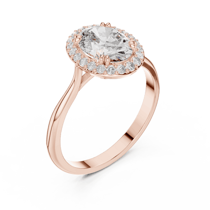 Classic halo diamond engagement ring featuring a brilliant round-cut center stone surrounded by a sparkling halo in a sleek cathedral-style setting by Orova Jewels.