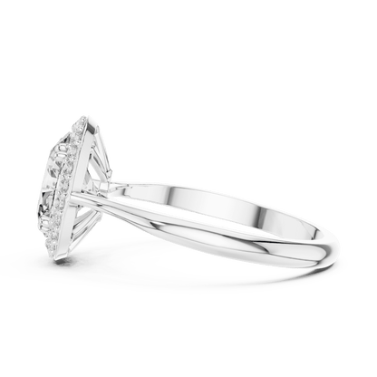 Classic halo diamond engagement ring featuring a brilliant round-cut center stone surrounded by a sparkling halo in a sleek cathedral-style setting by Orova Jewels.
