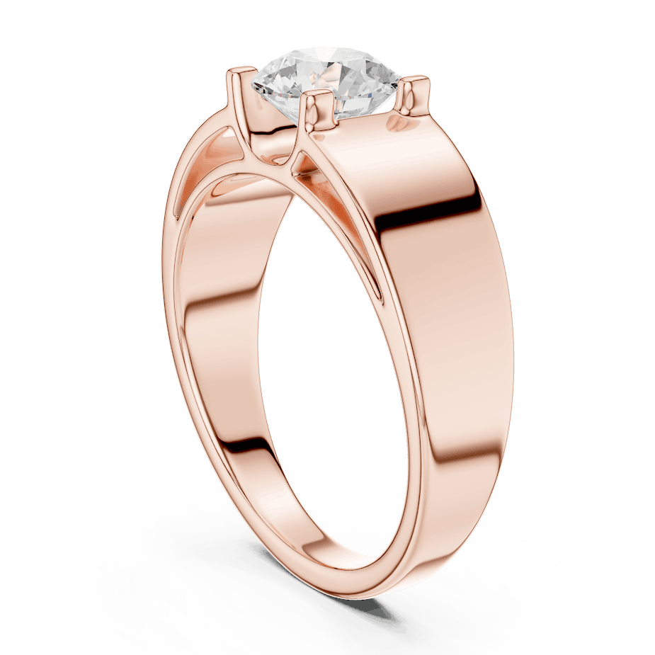 Classic solitaire diamond engagement ring featuring a brilliant round-cut stone in a four-prong setting with a sleek polished band by Orova Jewels.
