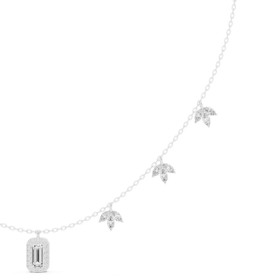 Emerald-cut diamond charm necklace featuring a delicate chain with sparkling station accents and a modern centerpiece by Orova Jewels.