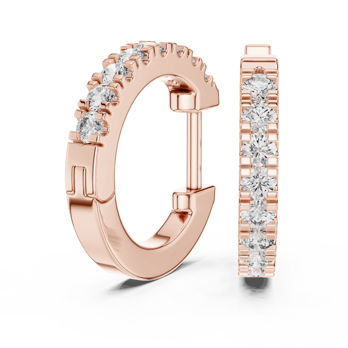 Diamond huggie hoop earrings featuring a row of sparkling round stones with a secure hinged closure by Orova Jewels.