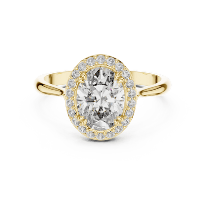 Classic halo diamond engagement ring featuring a brilliant round-cut center stone surrounded by a sparkling halo in a sleek cathedral-style setting by Orova Jewels.