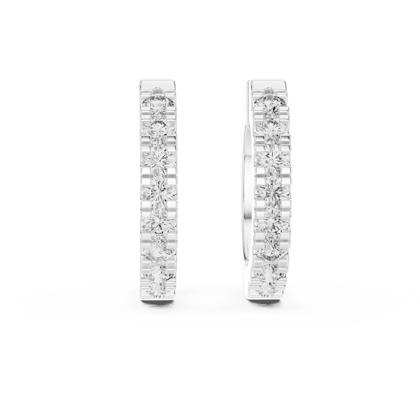 Diamond huggie hoop earrings featuring a row of sparkling round stones with a secure hinged closure by Orova Jewels.