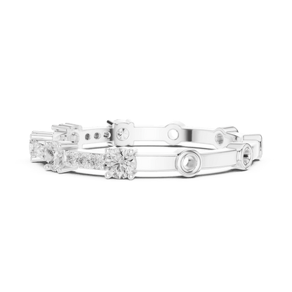 Shared Prong Diamond Eternity Band featuring brilliant round diamonds in a polished half eternity shared-prong setting by Orova Jewels.