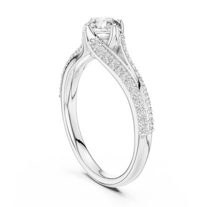 Twisted pavé solitaire diamond ring featuring a round-cut center stone, elegant crossover band, and sparkling pavé-set diamonds by Orova Jewels.