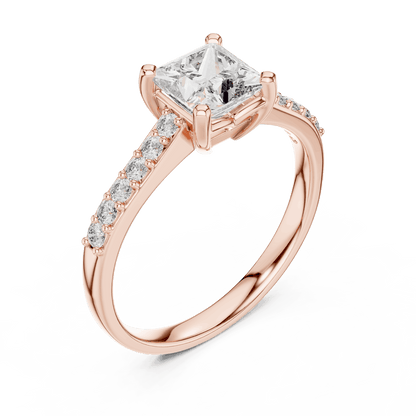 Classic pavé solitaire diamond engagement ring featuring a round-cut center stone in a four-prong setting with a sparkling pavé diamond band by Orova Jewels.
