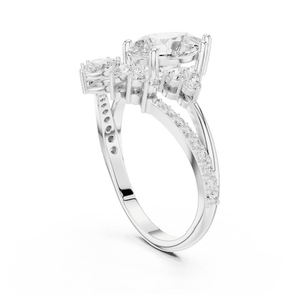 Three-stone diamond engagement ring featuring a brilliant round center stone, sparkling side stones, and a pavé-set band by Orova Jewels.