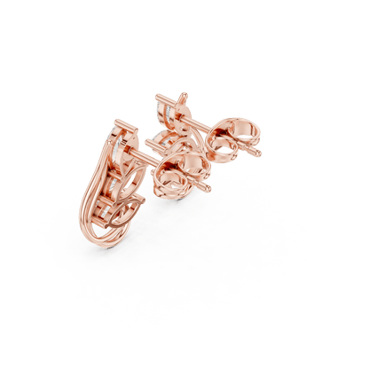 Marquise diamond leaf stud earrings featuring a nature-inspired design with sparkling marquise and round stones and secure push-back closures by Orova Jewels.