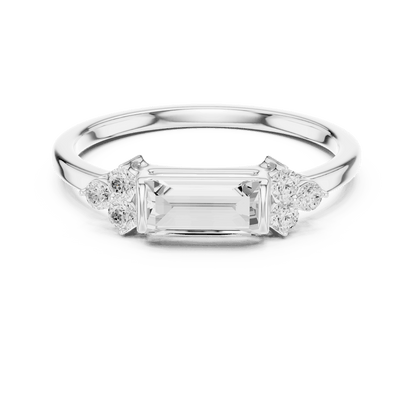 Emerald Cut Diamond Three-Stone Engagement Ring featuring an emerald-cut center stone with round diamond side accents on a polished band by Orova Jewels.