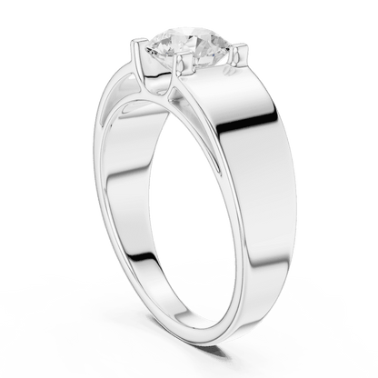 Classic solitaire diamond engagement ring featuring a brilliant round-cut stone in a four-prong setting with a sleek polished band by Orova Jewels.