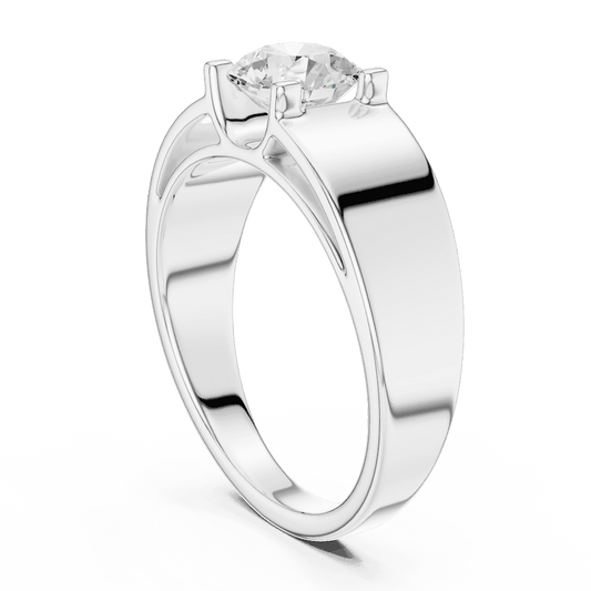 Classic solitaire diamond engagement ring featuring a brilliant round-cut stone in a four-prong setting with a sleek polished band by Orova Jewels.