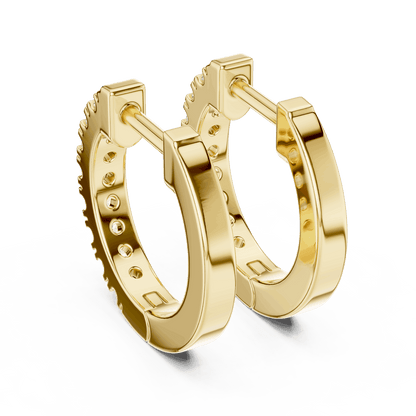Diamond huggie hoop earrings featuring a row of sparkling round stones with a secure hinged closure by Orova Jewels.