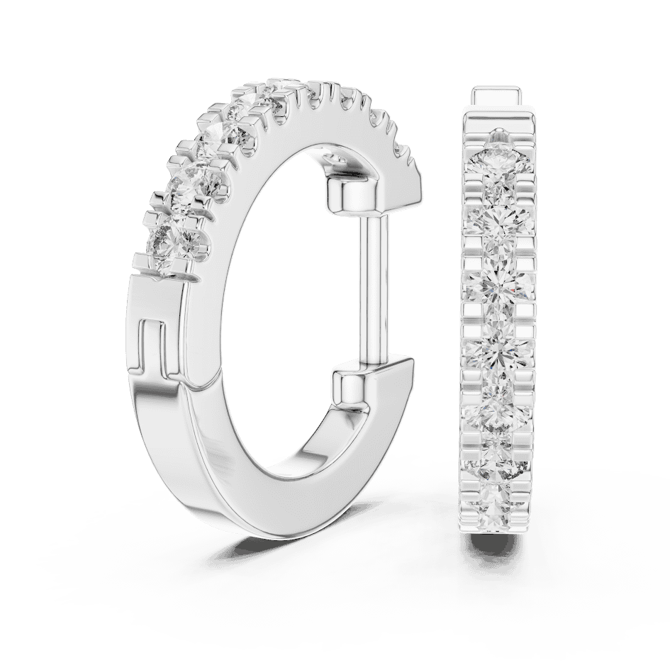 Diamond huggie hoop earrings featuring a row of sparkling round stones with a secure hinged closure by Orova Jewels.