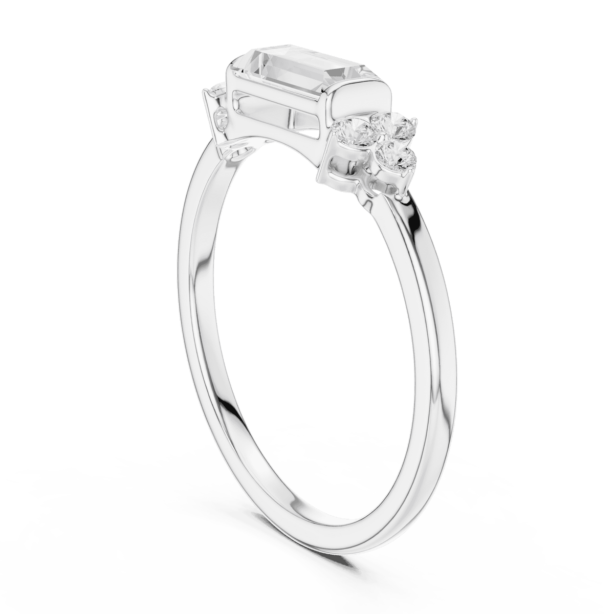 Emerald Cut Diamond Three-Stone Engagement Ring featuring an emerald-cut center stone with round diamond side accents on a polished band by Orova Jewels.