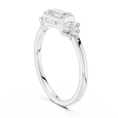 Emerald Cut Diamond Three-Stone Engagement Ring featuring an emerald-cut center stone with round diamond side accents on a polished band by Orova Jewels.