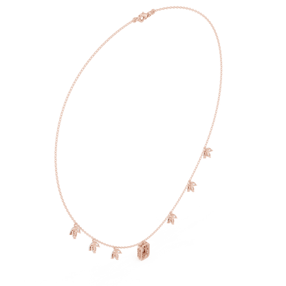 Emerald-cut diamond charm necklace featuring a delicate chain with sparkling station accents and a modern centerpiece by Orova Jewels.