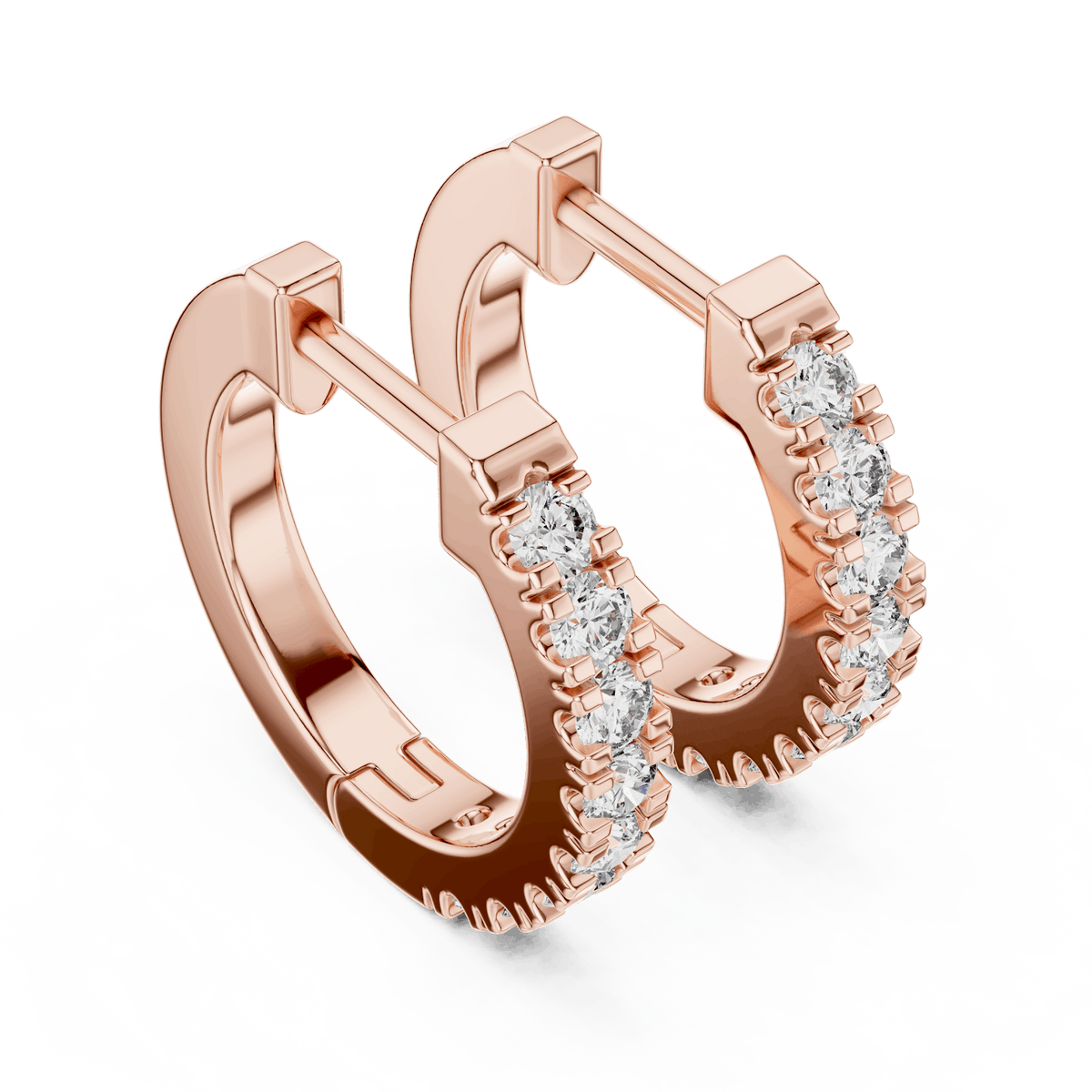 Diamond huggie hoop earrings featuring a row of sparkling round stones with a secure hinged closure by Orova Jewels.